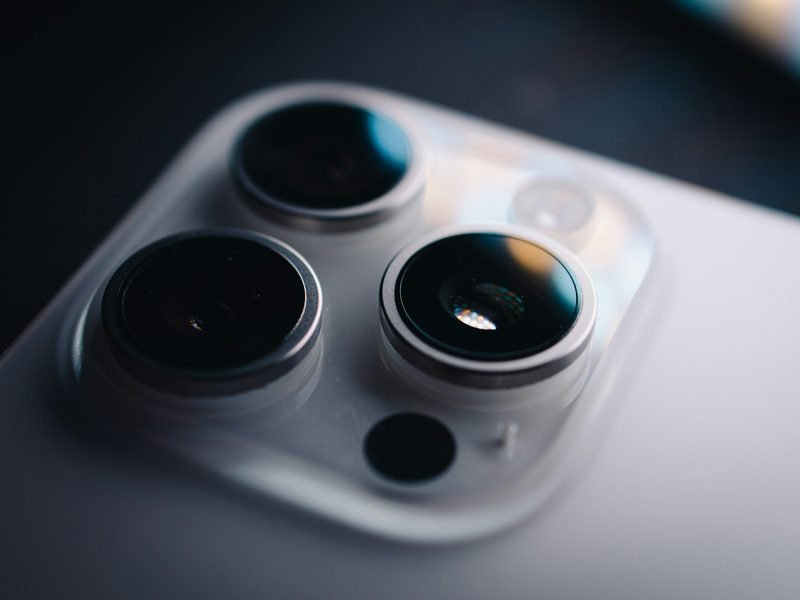 Close-up of the triple rear camera lenses on a smartphone